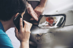 checking damage on car