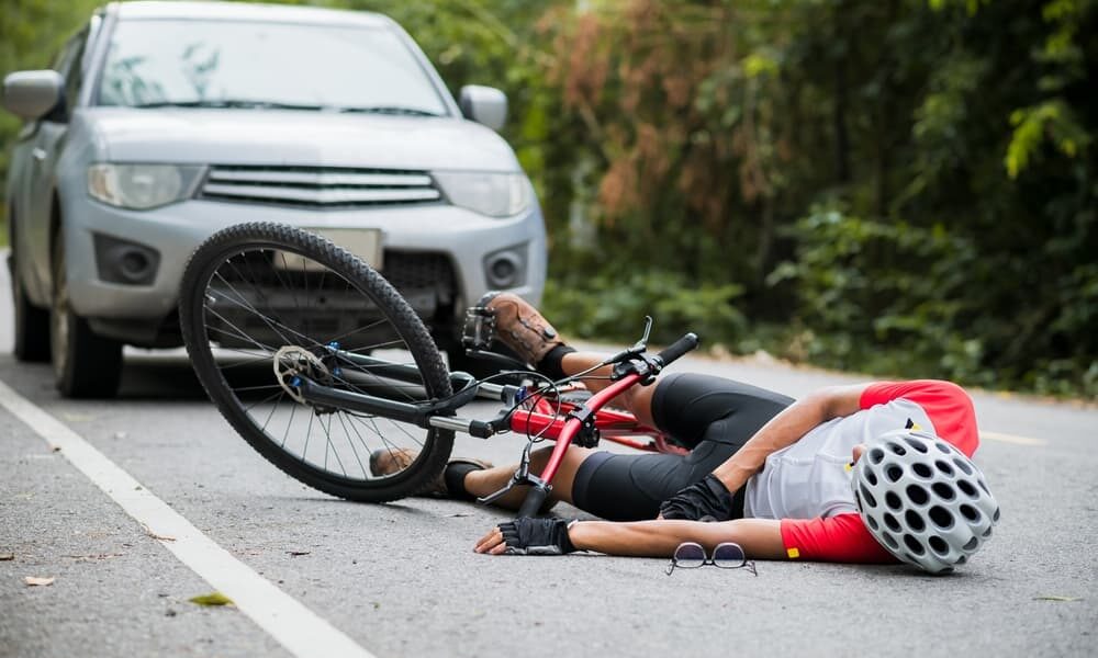 A biker was injured in a collision with a car on the road. The incident highlights the need for safer infrastructure to reduce accidents involving cyclists and motor vehicles.