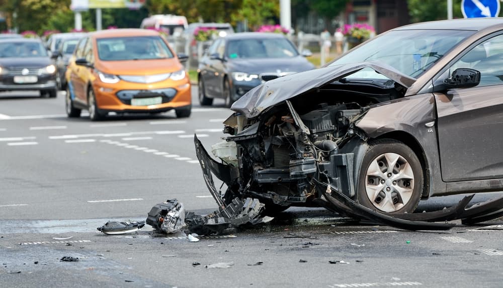 Car crash accident with a collision on a city street.