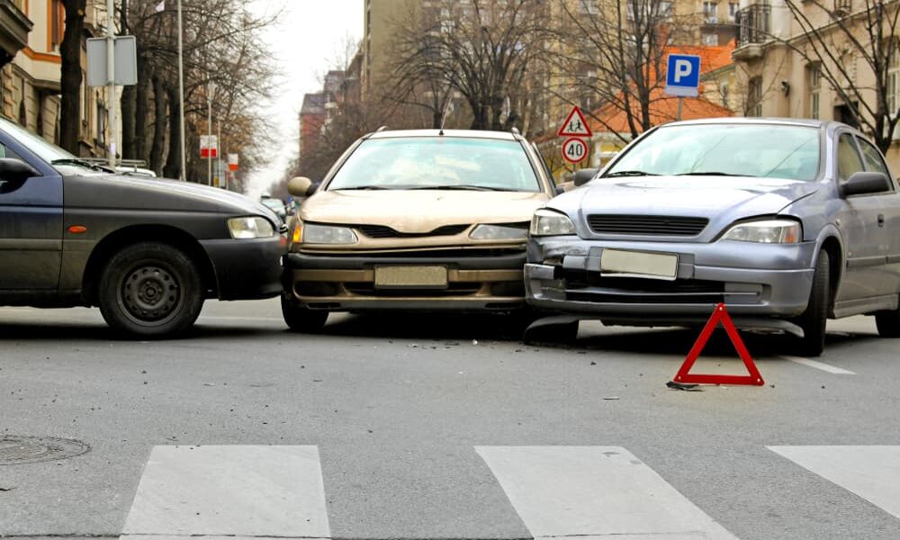 Three car crash traffic accident at street