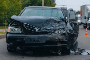 Severely damaged car after a front-end crash, symbolizing a car accident case in Tacoma.