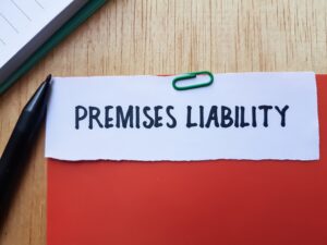 Paper labeled ‘Premises Liability’ clipped to a folder, representing a premises liability claim in Bellevue.