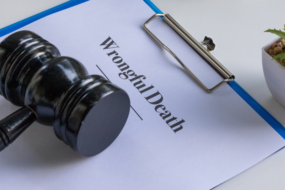 Gavel resting on a clipboard labeled &lsquo;Wrongful Death,&rsquo; symbolizing legal claims for wrongful death in Bellevue